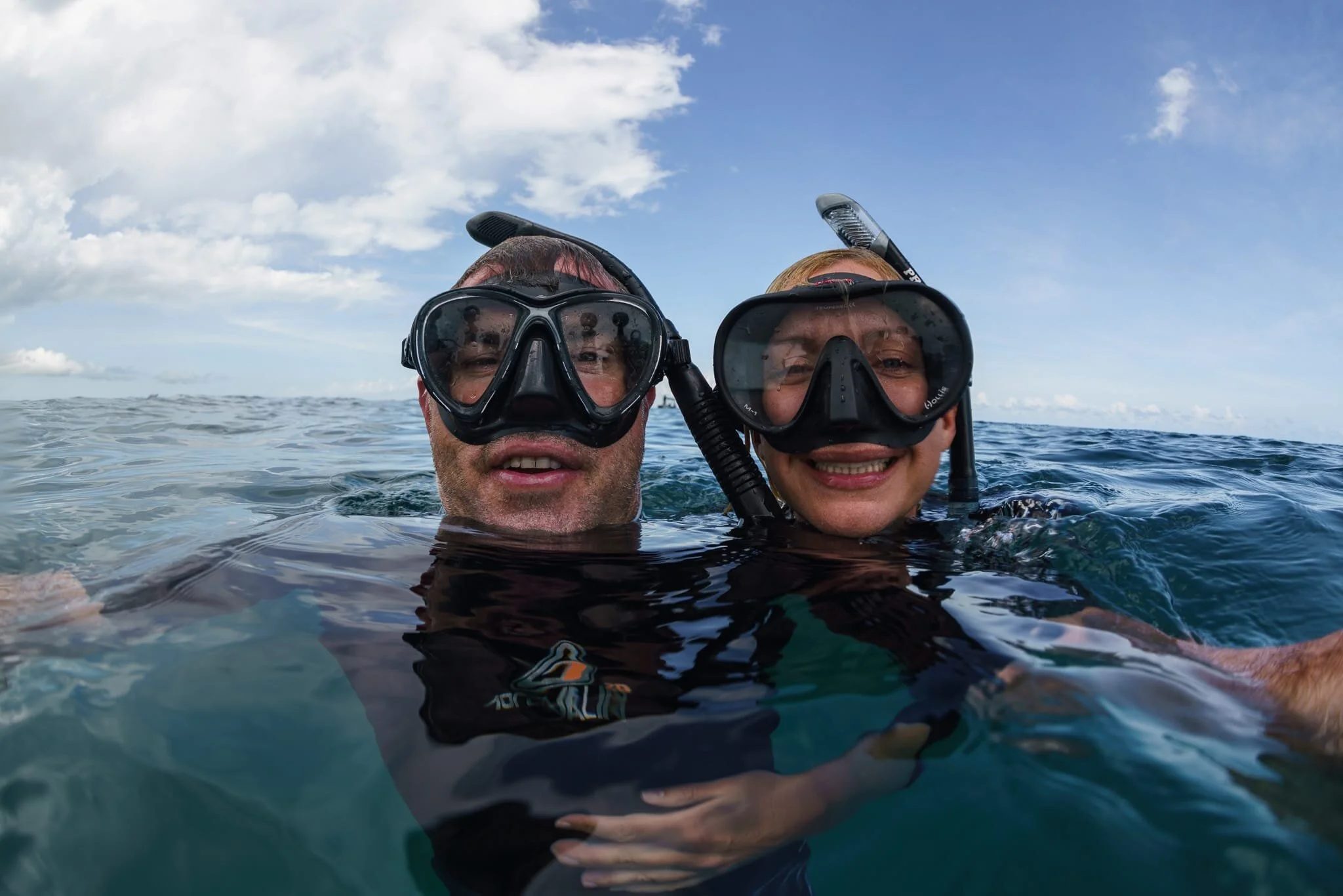 Simon and Mads snorkelling in their masks